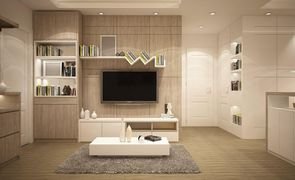 sala de estar com moveis brancos e marrom